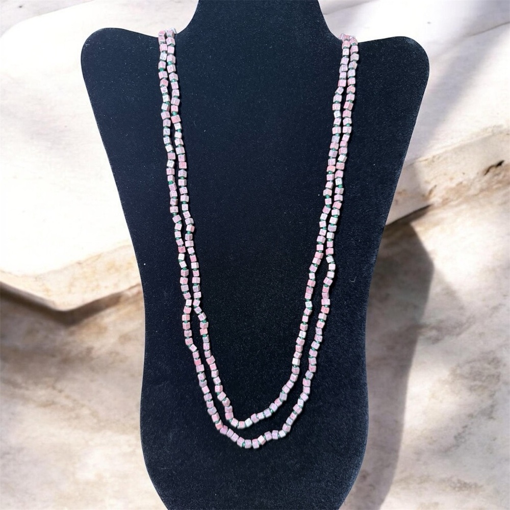 Purple-ish square wood like bead with alternating green glass bead